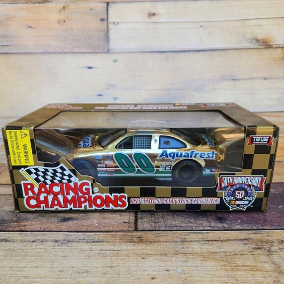 Racing Champions Buckshot Jones #00 Aquafresh Limited Edition Gold 1:24 NASCAR - Picture 1 of 8